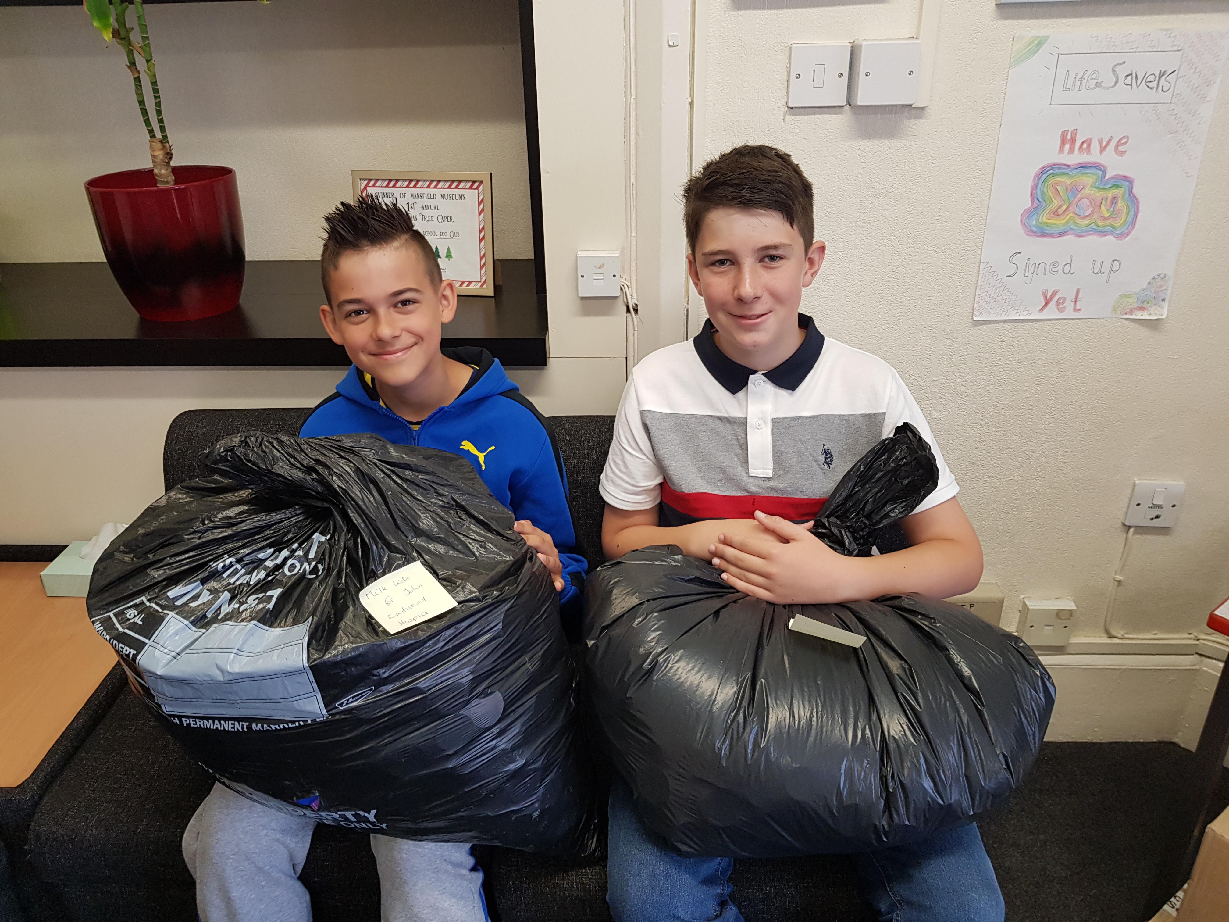 Eco Member and Honorary Eco Member pictured with the last lids for this year!